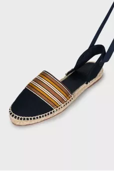 Textile sandals with woven soles