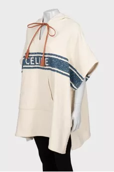 Cape with hood and branded logo