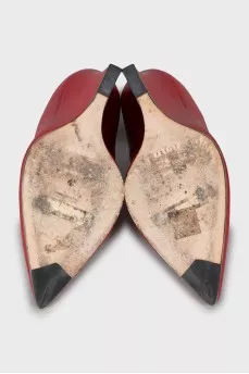 Leather shoes with a figured wedge heel