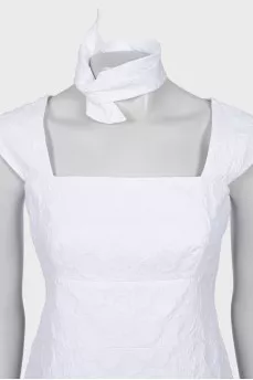White dress with relief pattern