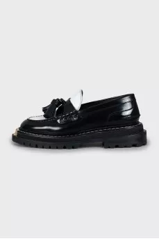 Black and white tassel loafers