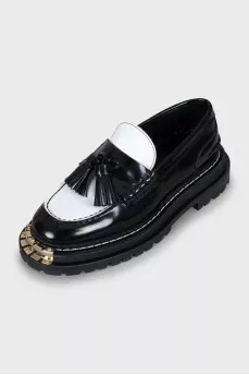 Black and white tassel loafers