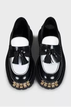 Black and white tassel loafers