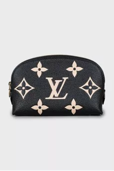 Leather cosmetic bag with embossing and tag