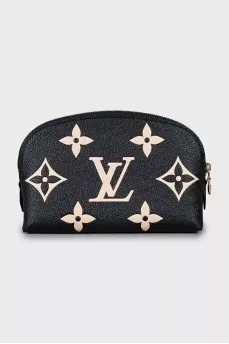 Leather cosmetic bag with embossing and tag
