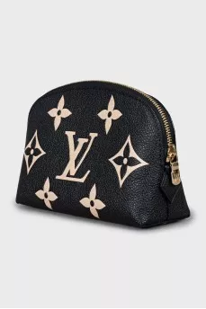 Leather cosmetic bag with embossing and tag