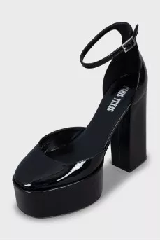 Black patent leather shoes with tag