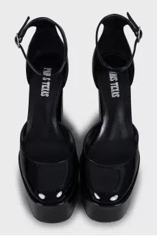Black patent leather shoes with tag