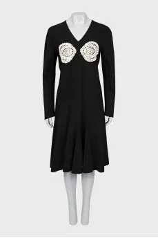 Decorated dress with long sleeves