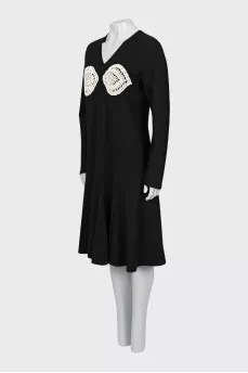 Decorated dress with long sleeves