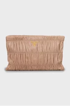 Leather clutch with gold logo