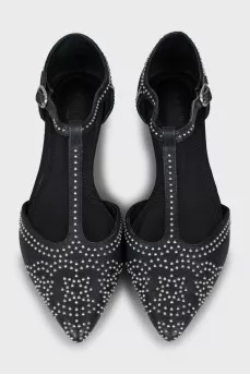 Black leather shoes with silver decor