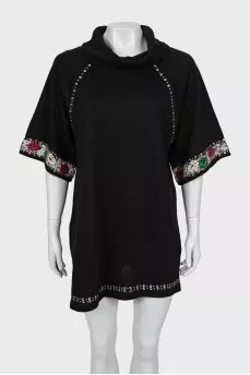 Sweater decorated with beads and embroidery