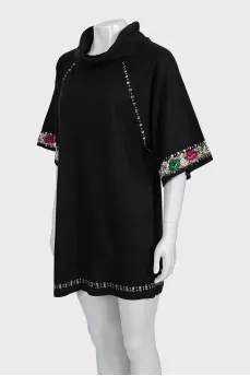 Sweater decorated with beads and embroidery
