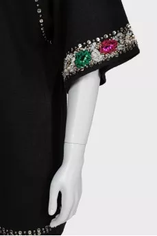 Sweater decorated with beads and embroidery