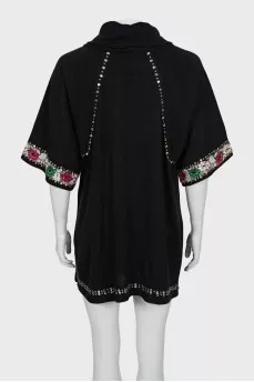 Sweater decorated with beads and embroidery