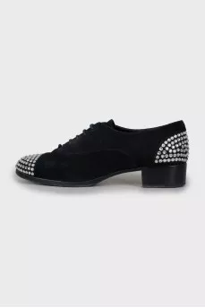 Suede shoes with rhinestones on the toes
