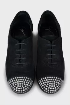 Suede shoes with rhinestones on the toes