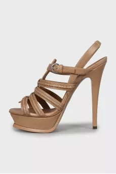 Brown leather sandals with tag