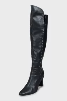 Leather over the knee boots with contrasting seams