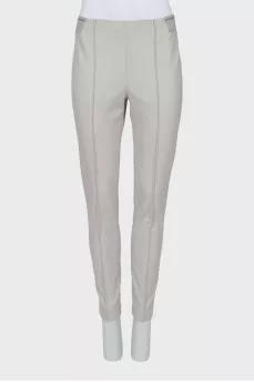 Trousers with elastic waistband and stitched creases