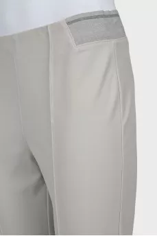 Trousers with elastic waistband and stitched creases