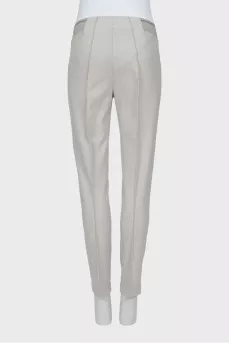 Trousers with elastic waistband and stitched creases