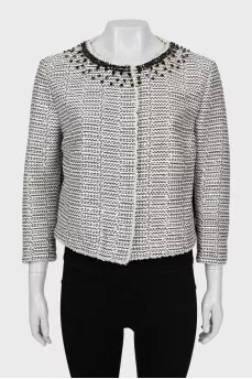 Jacket decorated with sequins and rhinestones