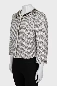 Jacket decorated with sequins and rhinestones