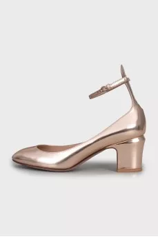 Gold colored mid heel shoes
