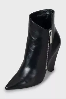 Black leather ankle boots with a figured heel