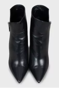 Black leather ankle boots with a figured heel