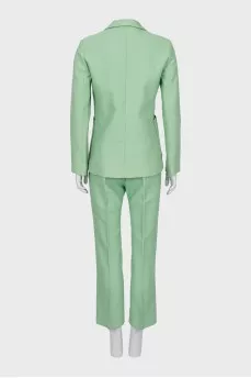 Green suit with tag