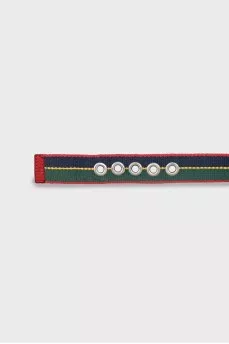Textile belt with massive buckle