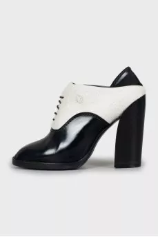 Black and white pony skin ankle boots