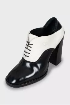 Black and white pony skin ankle boots