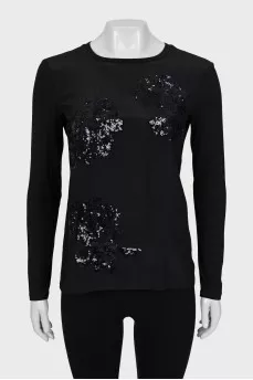 Blouse decorated with sequins