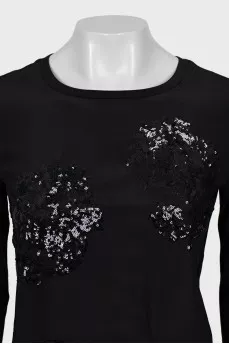 Blouse decorated with sequins