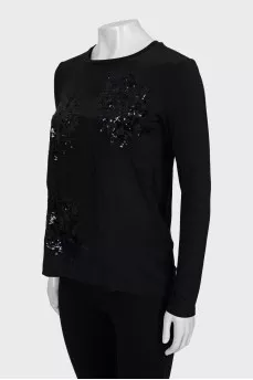 Blouse decorated with sequins