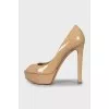 Beige patent leather shoes