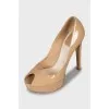 Beige patent leather shoes