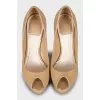 Beige patent leather shoes