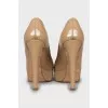 Beige patent leather shoes