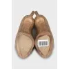 Beige patent leather shoes