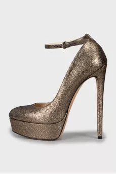 Golden high heels
