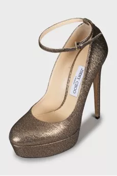 Golden high heels