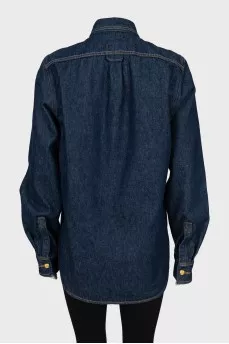 Denim shirt with gold buttons