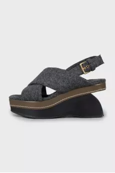 Textile sandals with a figured wedge heel