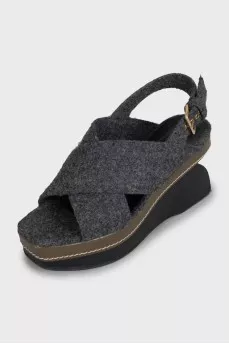 Textile sandals with a figured wedge heel