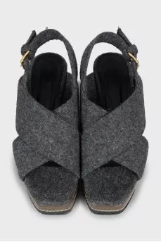 Textile sandals with a figured wedge heel